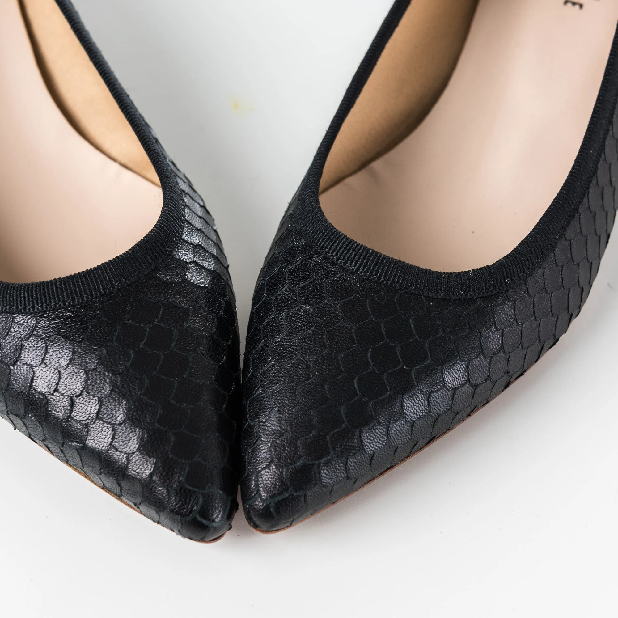 Black leather pointed toe ballet flats with cobra-skin effect