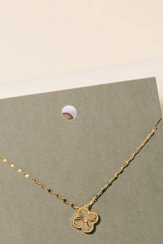 intricate gold clover pendant necklace